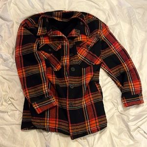 Plaid long overcoat. Slightly worn. No holes, tears, or stains.